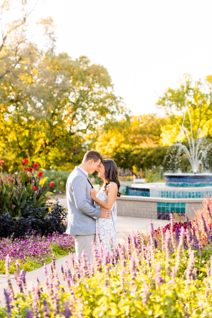 Colorful floral engagement photo session at Botanica Wichita