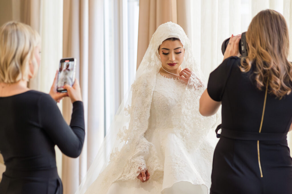 Wichita wedding photographer and content creator team documenting a bride on her wedding day.